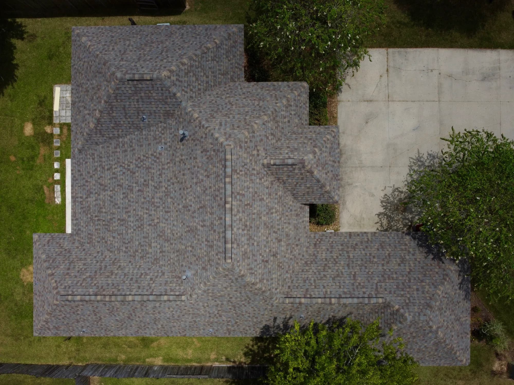 New multi-tone architectural shingle roof, top-down drone view